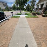 Beautifully restored and sealed paver driveway in Brandon by Peter’s Pressure Washing showing enhanced color, stabilized joints, and wet-look finish.
this is why paver sealing brandon matters