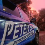Commercial pressure washer in use by Peter's Pressure Washing technician cleaning exterior surfaces in Tampa Bay